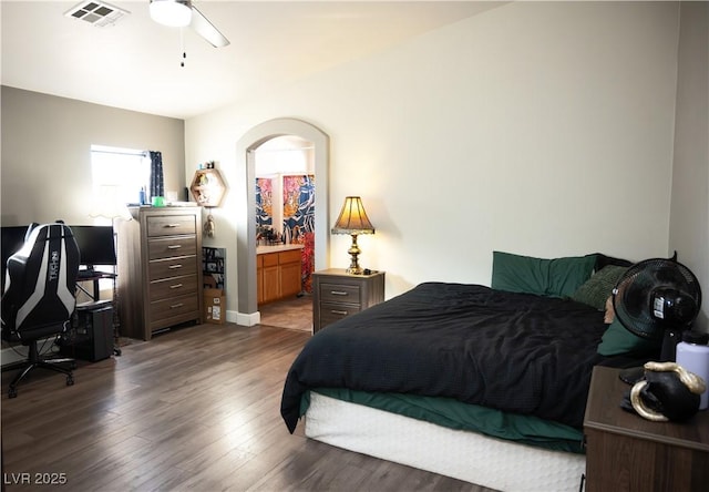 4848 Cutting Diamond Ct, North Las Vegas, NV 89081 - bedroom featuring dark wood-style flooring, a desk, and ensuite bathroom