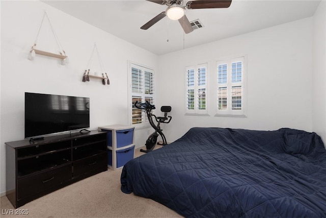 5620 Siena Rose St, North Las Vegas, NV 89031 - carpeted bedroom with a ceiling fan