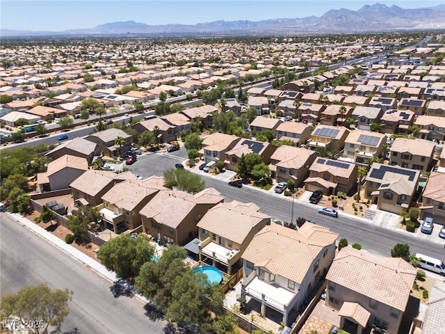 5620 Siena Rose St, North Las Vegas, NV 89031 - aerial perspective of suburban area featuring a mountain backdrop