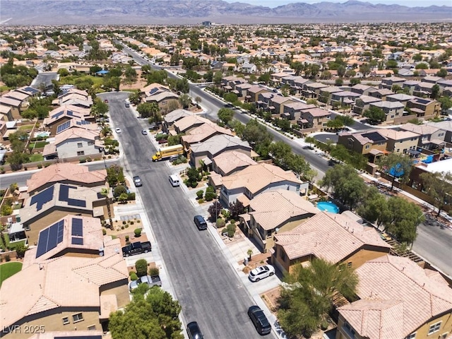 5620 Siena Rose St, North Las Vegas, NV 89031 - aerial perspective of suburban area featuring a mountain backdrop