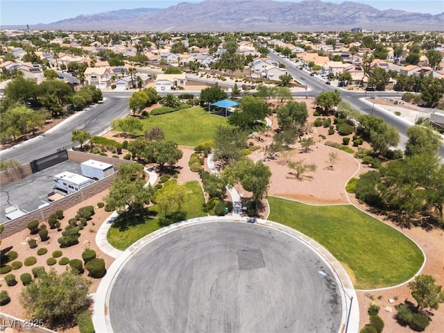 5620 Siena Rose St, North Las Vegas, NV 89031 - aerial perspective of suburban area featuring a mountainous background