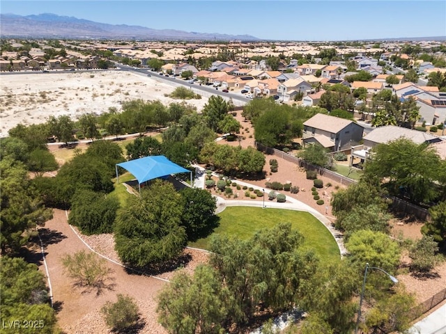 5620 Siena Rose St, North Las Vegas, NV 89031 - aerial perspective of suburban area featuring a mountain backdrop