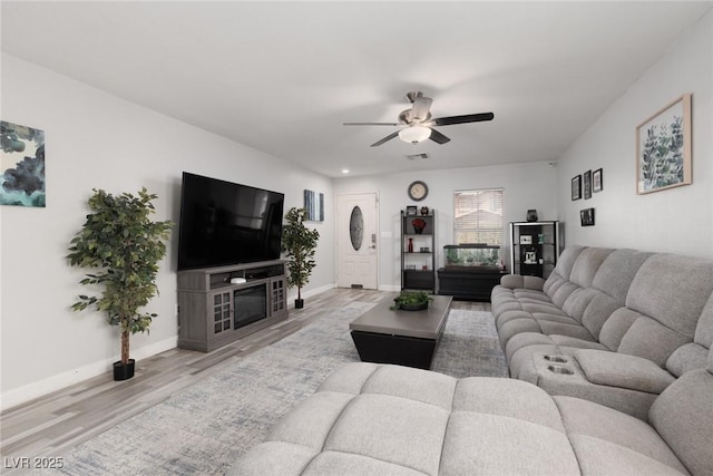 5620 Siena Rose St, North Las Vegas, NV 89031 - living area featuring wood finished floors and ceiling fan