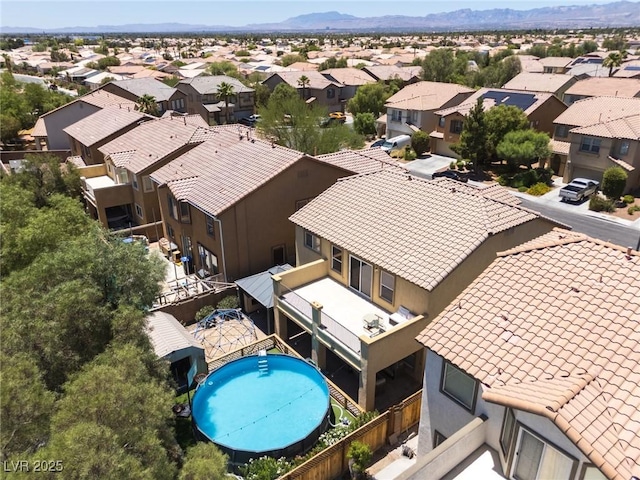 5620 Siena Rose St, North Las Vegas, NV 89031 - aerial view of residential area featuring a mountainous background