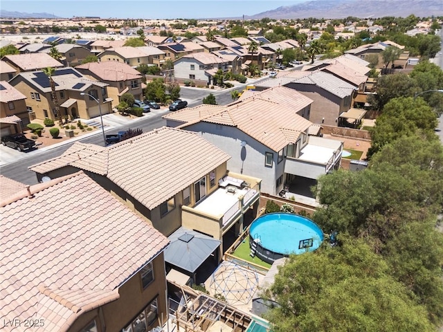 5620 Siena Rose St, North Las Vegas, NV 89031 - aerial perspective of suburban area featuring a mountainous background