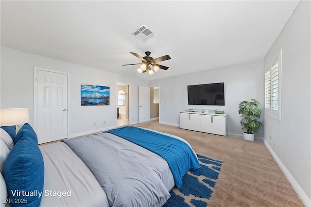 9409 Kayla Ct, Las Vegas, NV 89134 - carpeted bedroom with multiple windows and ceiling fan