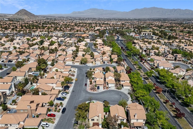 9409 Kayla Ct, Las Vegas, NV 89134 - aerial view of property and surrounding area featuring a mountainous background and nearby suburban area