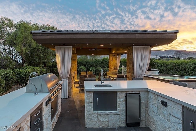 15 Golden Sunray Ln, Las Vegas, NV 89135 - view of patio / terrace featuring area for grilling, a gazebo, and a ceiling fan