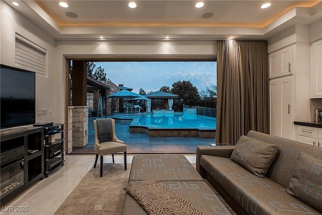 15 Golden Sunray Ln, Las Vegas, NV 89135 - living area featuring a raised ceiling and recessed lighting