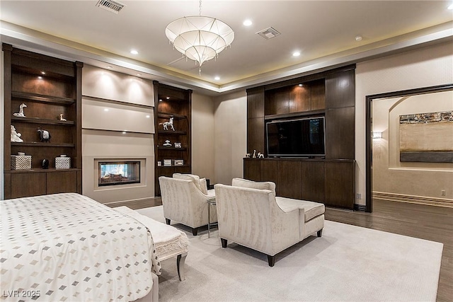15 Golden Sunray Ln, Las Vegas, NV 89135 - bedroom with a fireplace, recessed lighting, and light wood-style floors