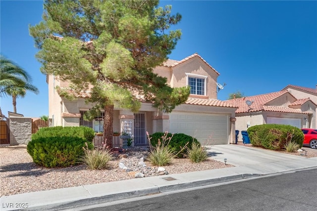 1048 Menands Ave, Las Vegas, NV 89123 - view of front of house featuring concrete driveway, stucco siding, and a tiled roof