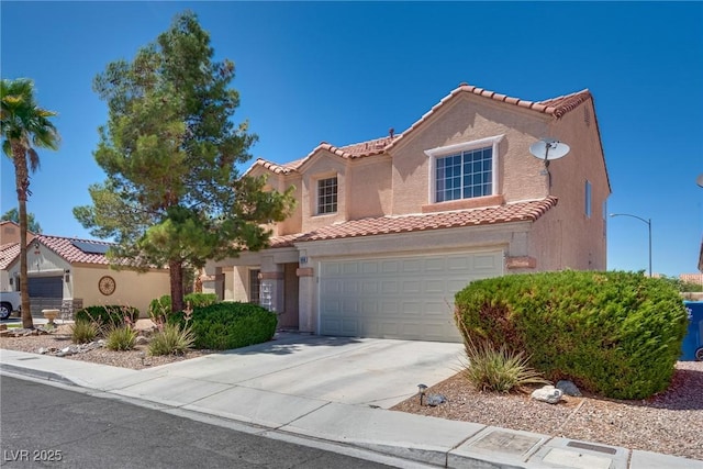 1048 Menands Ave, Las Vegas, NV 89123 - mediterranean / spanish-style house featuring a tile roof, concrete driveway, stucco siding, and a garage