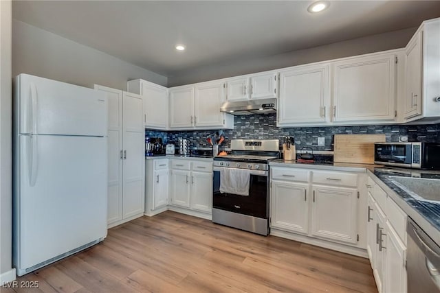 1048 Menands Ave, Las Vegas, NV 89123 - kitchen featuring appliances with stainless steel finishes, under cabinet range hood, white cabinetry, and recessed lighting