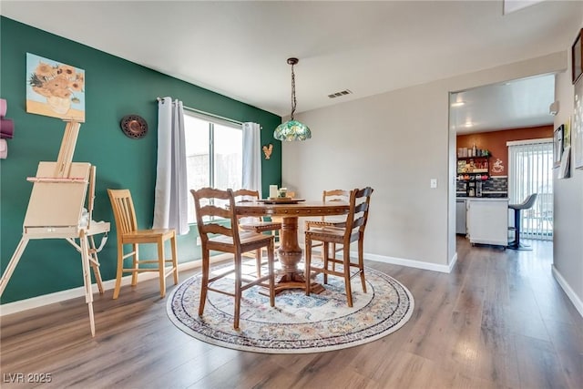 1048 Menands Ave, Las Vegas, NV 89123 - dining room featuring wood finished floors