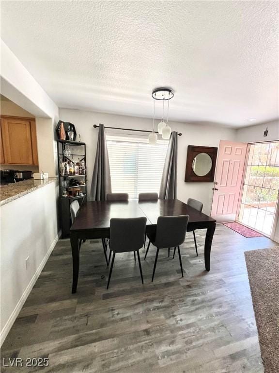 39 Belle La Blanc Ave, Las Vegas, NV 89123 - dining space featuring a textured ceiling and dark wood-style floors