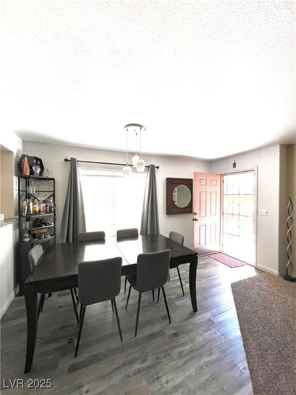 39 Belle La Blanc Ave, Las Vegas, NV 89123 - dining area featuring a textured ceiling and wood finished floors