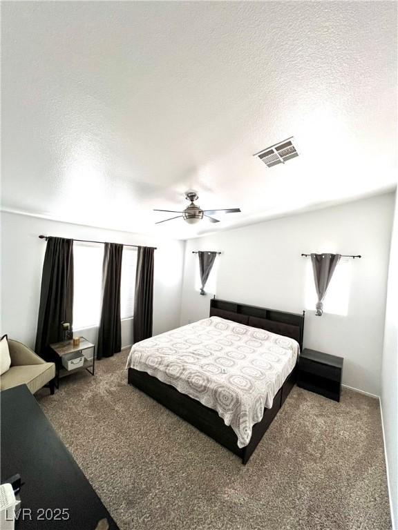 39 Belle La Blanc Ave, Las Vegas, NV 89123 - bedroom with carpet, a textured ceiling, and ceiling fan