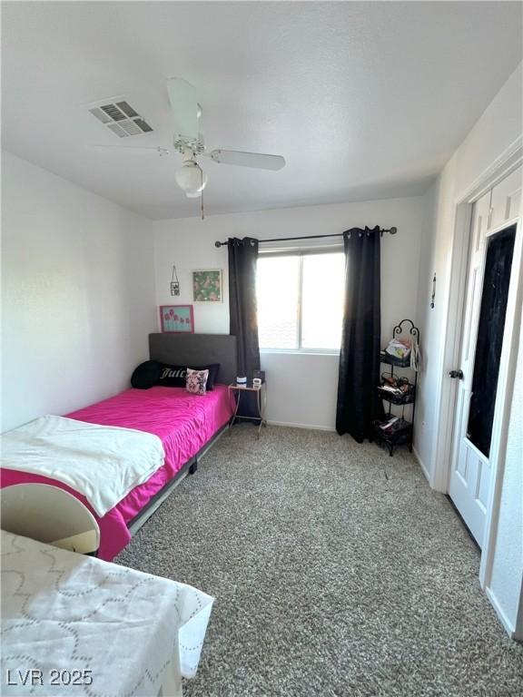 39 Belle La Blanc Ave, Las Vegas, NV 89123 - carpeted bedroom with ceiling fan and baseboards