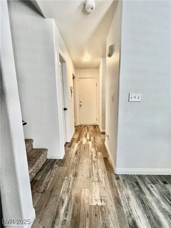 39 Belle La Blanc Ave, Las Vegas, NV 89123 - hallway featuring wood finished floors and stairs