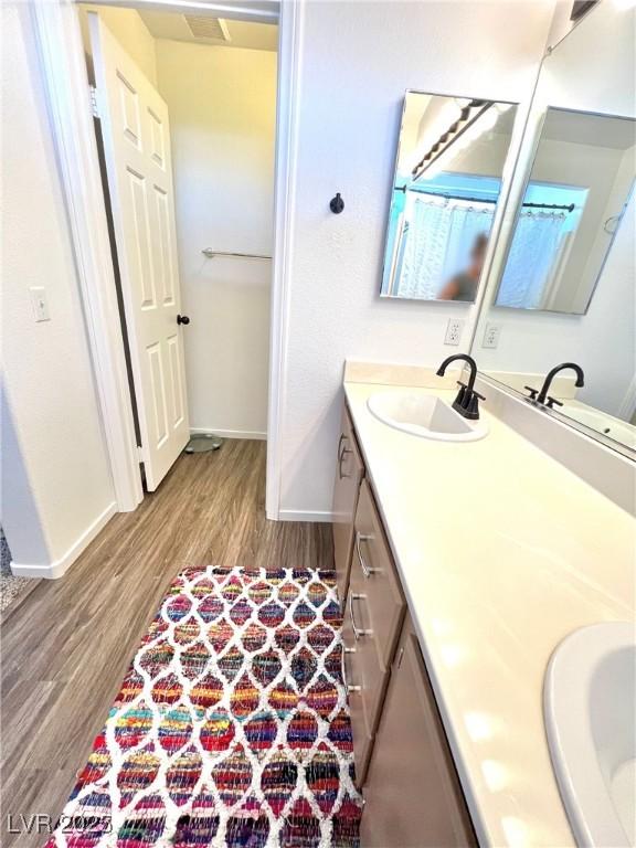 39 Belle La Blanc Ave, Las Vegas, NV 89123 - full bath with double vanity and wood finished floors