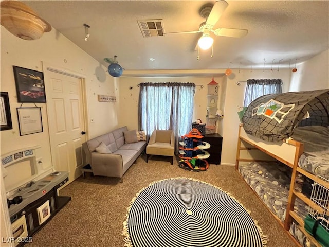 39 Belle La Blanc Ave, Las Vegas, NV 89123 - carpeted living area featuring a ceiling fan, a textured ceiling, and lofted ceiling