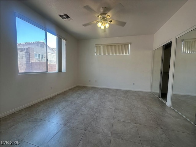 8042 Palace Monaco Ave, Las Vegas, NV 89117 - empty room featuring ceiling fan and tile patterned flooring