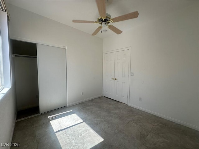 8042 Palace Monaco Ave, Las Vegas, NV 89117 - unfurnished bedroom featuring baseboards and a ceiling fan