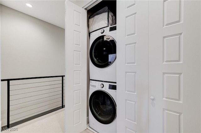 659 Spotted Falcon St, Las Vegas, NV 89138 - washroom with stacked washing machine and dryer and recessed lighting