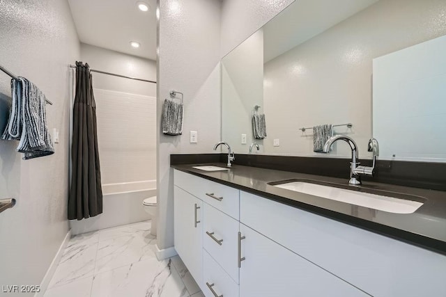6834 Compass St, North Las Vegas, NV 89084 - full bath with marble look tile flooring, double vanity, shower / bathtub combination with curtain, and recessed lighting