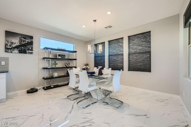 6834 Compass St, North Las Vegas, NV 89084 - dining area with recessed lighting and marble finish floors
