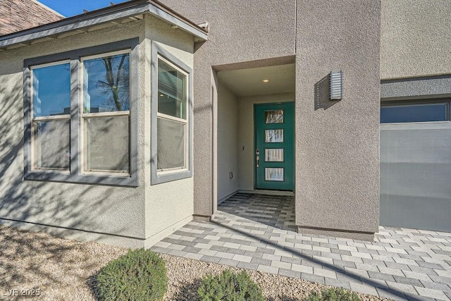6834 Compass St, North Las Vegas, NV 89084 - doorway to property with stucco siding