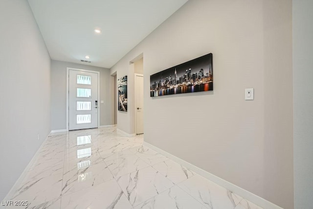 6834 Compass St, North Las Vegas, NV 89084 - hallway featuring recessed lighting and light marble finish flooring