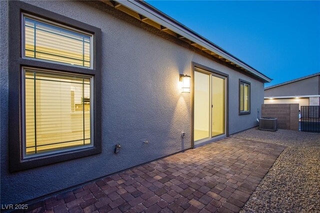 909 Allister Fields Ln, Las Vegas, NV 89138 - back of property with stucco siding and a patio area