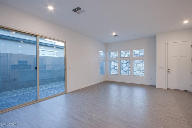 909 Allister Fields Ln, Las Vegas, NV 89138 - empty room with wood finished floors and recessed lighting