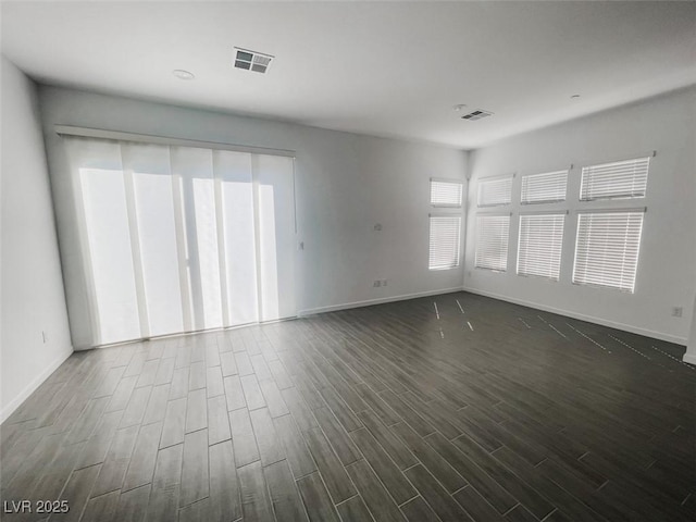 909 Allister Fields Ln, Las Vegas, NV 89138 - empty room with dark wood-style floors and baseboards