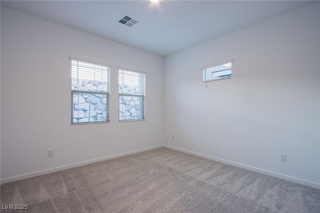 909 Allister Fields Ln, Las Vegas, NV 89138 - empty room featuring plenty of natural light and carpet flooring