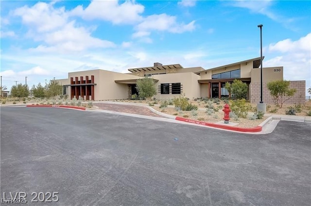 909 Allister Fields Ln, Las Vegas, NV 89138 - view of front facade with stucco siding