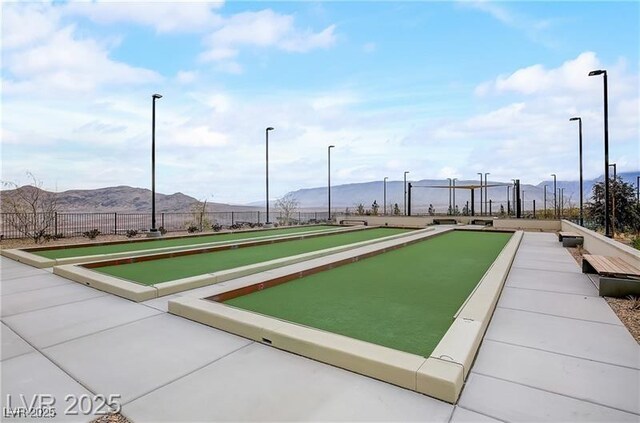 909 Allister Fields Ln, Las Vegas, NV 89138 - view of property's community featuring a bocce ball area and a mountain view