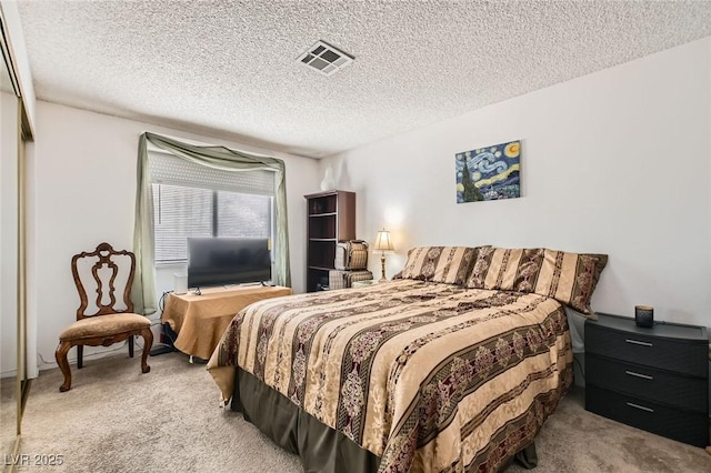 1104 Pinto Rock Ln Unit 101, Las Vegas, NV 89128 - carpeted bedroom featuring a textured ceiling