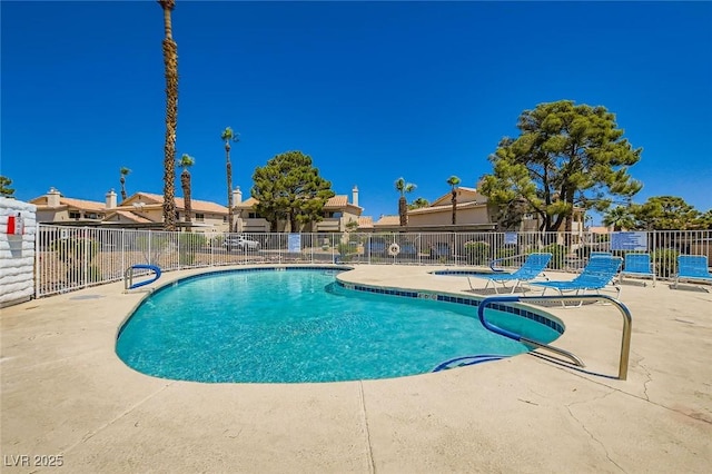 1104 Pinto Rock Ln Unit 101, Las Vegas, NV 89128 - community pool featuring a patio