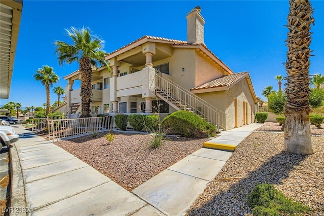 1104 Pinto Rock Ln Unit 101, Las Vegas, NV 89128 - view of property featuring stairs
