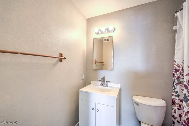1381 E University Ave Unit 204, Las Vegas, NV 89119 - bathroom featuring vanity and curtained shower