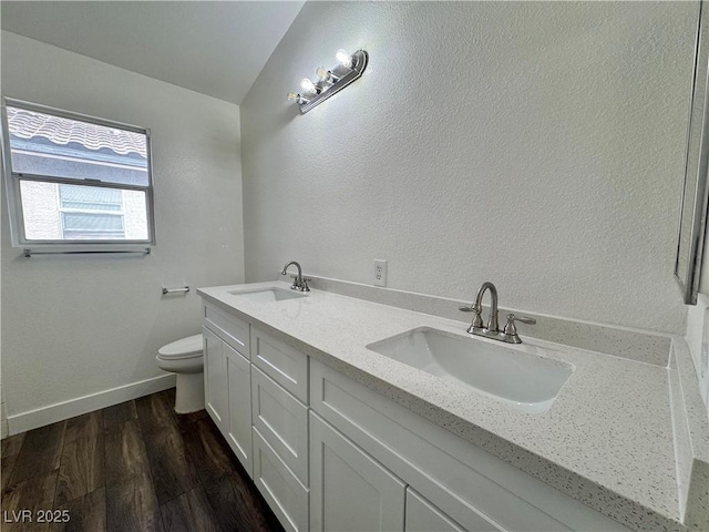 6063 Peach Orchard Rd, Las Vegas, NV 89142 - bathroom with double vanity and wood finished floors