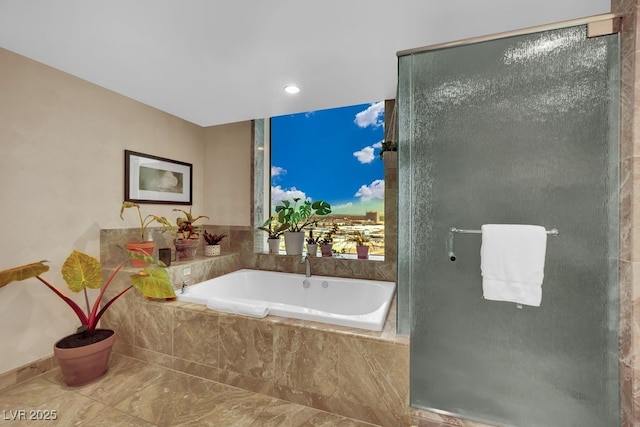 2000 N Fashion Show Dr Unit 2222, Las Vegas, NV 89109 - full bathroom featuring a garden tub, a stall shower, and recessed lighting