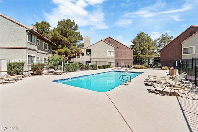 5038 S Rainbow Blvd Unit 206, Las Vegas, NV 89118 - community pool featuring a patio