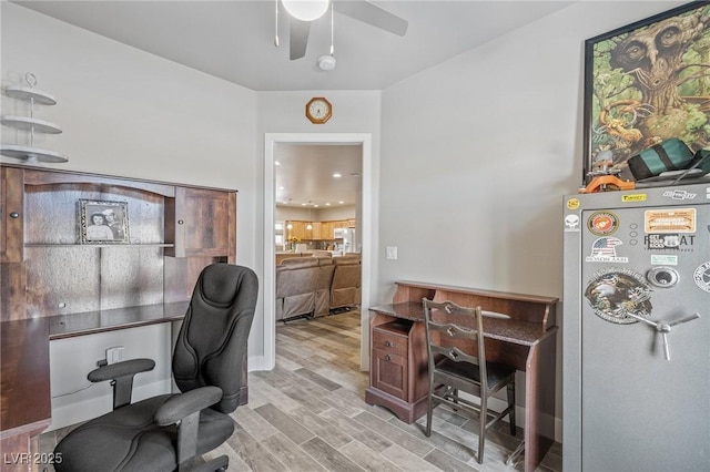 171 Weeping Willow Ct, Pahrump, NV 89048 - home office with ceiling fan and light wood-style floors