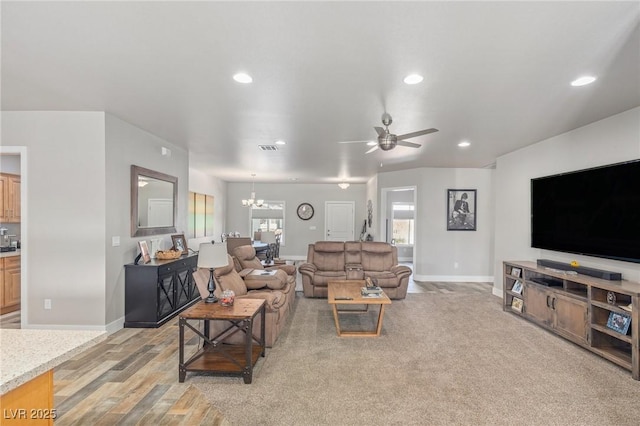171 Weeping Willow Ct, Pahrump, NV 89048 - living room with a chandelier, ceiling fan, recessed lighting, and light wood-style flooring