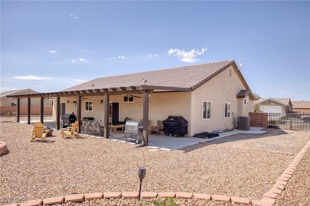 171 Weeping Willow Ct, Pahrump, NV 89048 - rear view of property with stucco siding, a tiled roof, and a patio