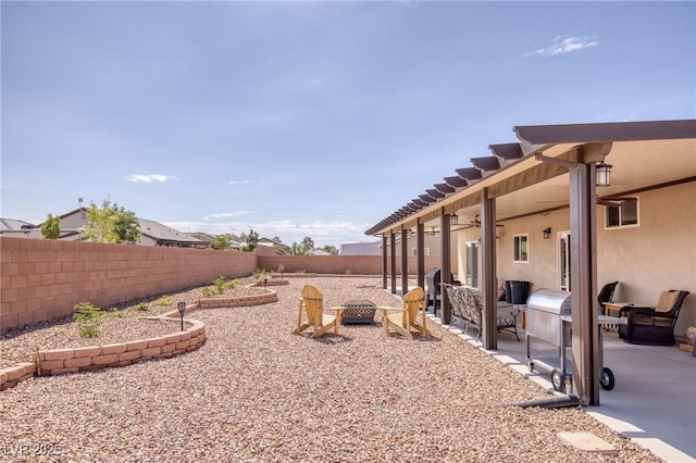 171 Weeping Willow Ct, Pahrump, NV 89048 - fenced backyard featuring a ceiling fan and a patio