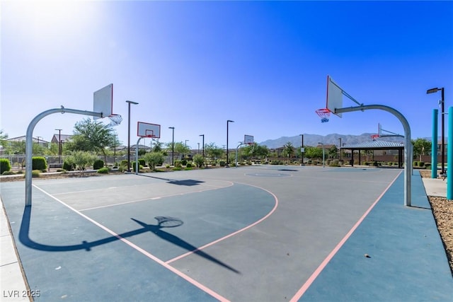 6909 Toll Mountain St, North Las Vegas, NV 89086 - view of basketball court featuring community basketball court and a mountain view